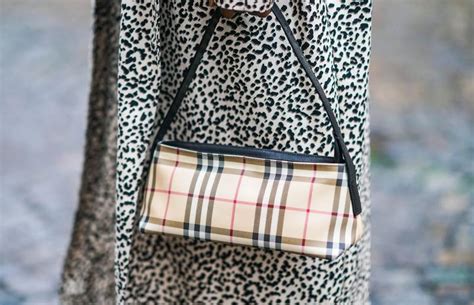 how to spot a fake burberry clutch bag|burberry clutch bag sale.